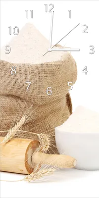 Produktbild von Wallario Design Wanduhr bedruckt, Größe 30 x 60 cm, Motiv: Backen-Ensemble mit Nudelholz, Mehl-Sack, Ähren und Zucker