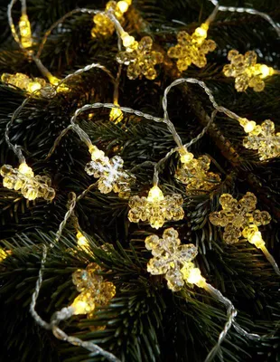 Immagine prodotto di Catena luminosa a LED BJÄLLRA 20 LED bianco caldo fiocco di neve