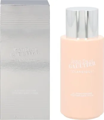 A product shot of a Jean Paul Gaultier Classique Body Lotion and its packaging.