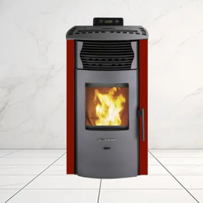 A red and gray pellet stove with flames visible inside, set against a marble-like wall and tiled floor.