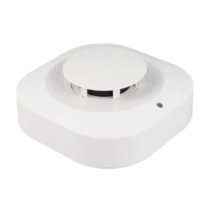 A white smoke detector is shown against a white background.