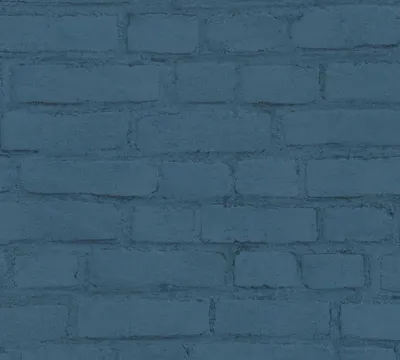 A close-up view of a blue brick wall.