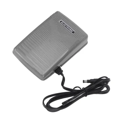 A gray electronic sewing machine foot pedal with a black cord and plug, shown on a white background.