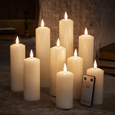 Produktbild von Lights4fun TruGlow® 9er Set Echtwachs LED Kerzen mit Fernbedienung und Timer batteriebetrieben Muttertagsgeschenk Kerze LED Echtwachskerzen LED Kerzen Set