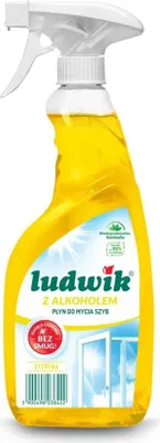 A yellow spray bottle of cleaning fluid with a label.