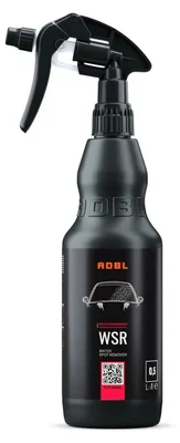 A black spray bottle with a black trigger spray nozzle, labeled with product information.