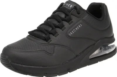 A black Skechers sneaker with a clear air bubble in the heel.