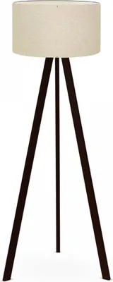 A floor lamp with a beige fabric shade and three dark brown wooden legs.