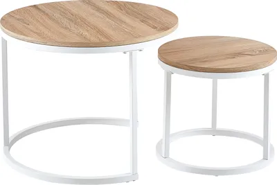Two round nesting coffee tables with wood-look tops and white metal frames against a white background.
