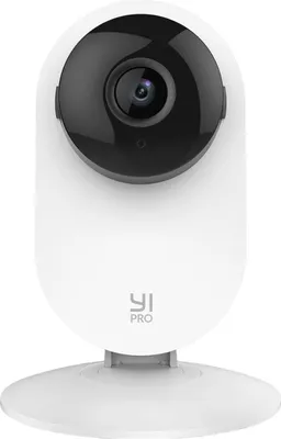 A white YI Pro security camera is shown from the front on a white base.