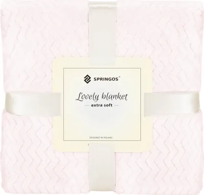 A folded pink blanket with a patterned texture, tied with a white ribbon and a product label.