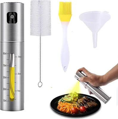 A set of kitchen tools including an oil sprayer, cleaning brush, basting brush, and funnel, with a person spraying oil onto food.