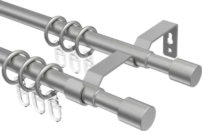 A double curtain rod with rings and clips, shown against a white background.