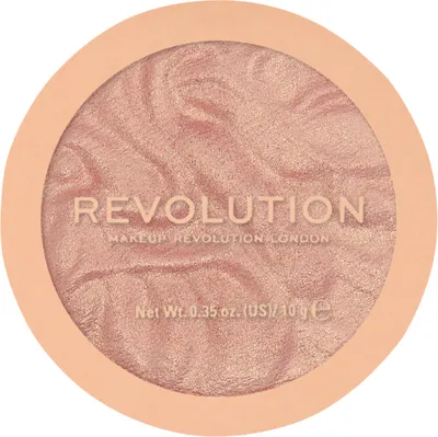 A close-up, top-down view of a round makeup compact with a swirled pink and gold powder inside, featuring brand and product information printed on the powder.