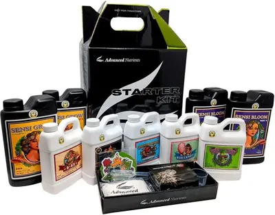 A collection of Advanced Nutrients products, including bottles and a starter kit box, arranged on a white background.