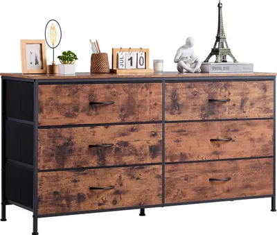 A dresser with six drawers is shown on a white background, with decorative items on top.