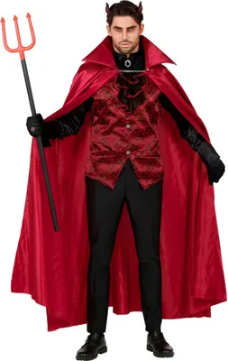 A man dressed in a devil costume, holding a trident.