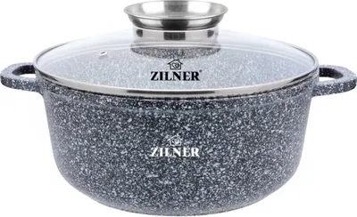 A speckled gray pot with a glass lid and silver handles sits on a white background.