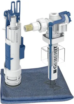Two plumbing components for a toilet cistern, one fill valve and one flush valve, are displayed on a blue cloth.