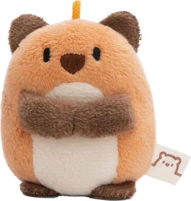 A small, plush toy fox with its arms crossed.
