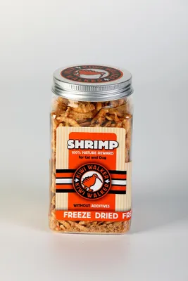 A clear studio shot of a jar of freeze-dried shrimp treats for cats and dogs.
