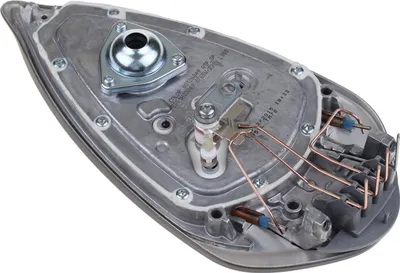 The underside of an iron soleplate with internal heating and steam components.