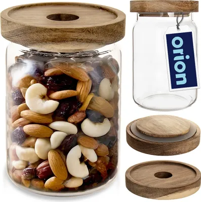 A collage of images showing a glass jar filled with nuts and dried fruit, an empty glass jar with a tag, and two wooden lids.