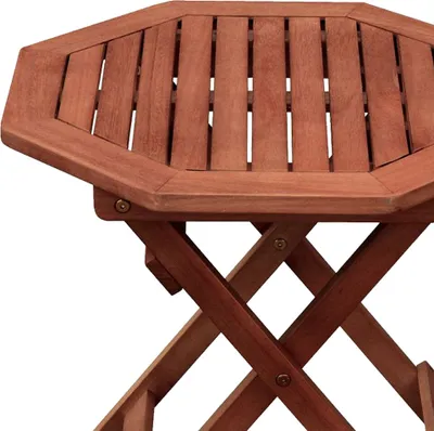 A close-up view of a wooden octagonal folding table.