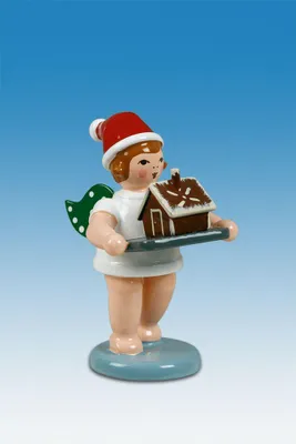 Produktbild von Holzfigur Bäckerengel mit Pfefferkuchenhaus und Mütze Höhe 6cm NEU