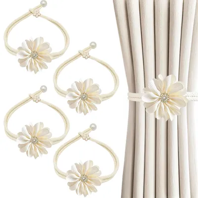 Image de 4 supports de rideaux avec motif floral
