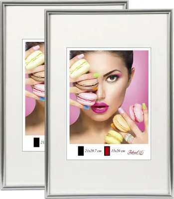 Two silver picture frames are shown, with the right frame displaying a close-up of a woman holding macarons.