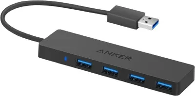 A black Anker USB 3.0 hub with four ports and a connected USB cable is shown against a white background.