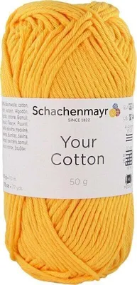 A ball of yellow yarn with a label.