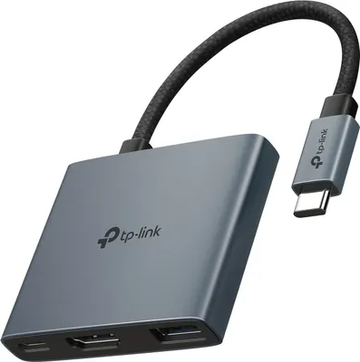 A close-up studio shot of a USB-C hub with multiple ports and a braided cable.