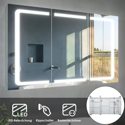 A lit bathroom mirror cabinet with doors, reflecting a window view.