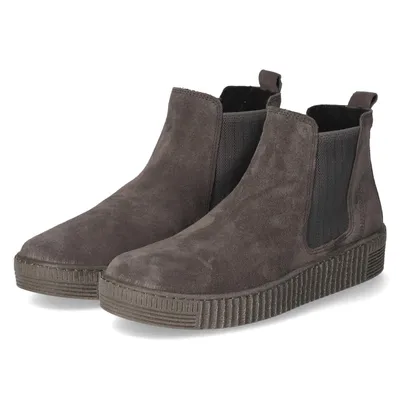 A pair of gray suede Chelsea boots with a thick, ribbed sole, presented on a white background.