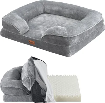 A grey orthopedic dog bed is shown from a slightly elevated angle, with a disassembled view of the bed showing its internal foam and cover below.