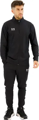 A man wearing a black tracksuit.