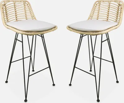 Two bar stools with rattan seats and black metal legs are shown against a white background.