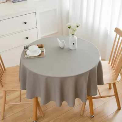 Imagen del producto de Manta redonda para mesa UnboxG, diámetro 140 cm, color gris claro, aspecto de lino, resistente al agua y lavable a máquina. Elegante mantel para mesa de comedor, cafetería, cenas, celebraciones y salón