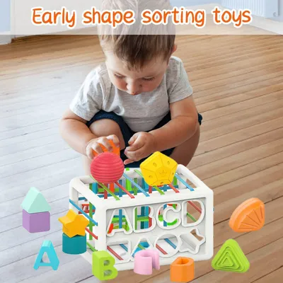 Immagine prodotto di Giocattolo di selezione delle forme per bambini con elastici, cestino sensoriale, giocattolo educativo per bambini e bambine