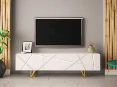 A modern living room setup featuring a white TV stand with a television mounted above it.