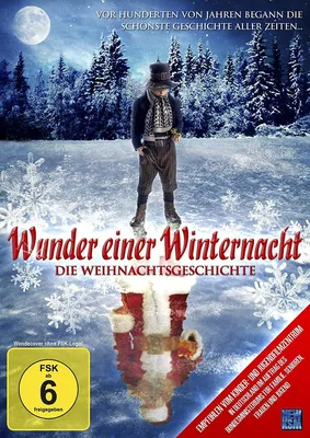 A DVD cover for a Christmas movie titled 'Wunder einer Winternacht - Die Weihnachtsgeschichte', featuring a young boy in winter attire on an icy surface with a reflection of Santa Claus.
