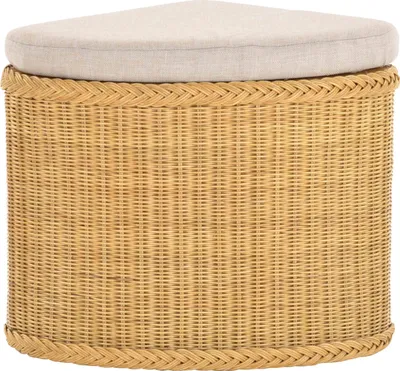 A corner wicker ottoman with a padded seat.