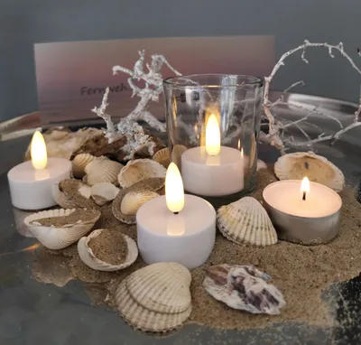 Produktbild von 4er Set LED Teelichter 3D Flamme wie echt inklusive Batterie mit Timer warmweiß Flammeneffekt CR2032