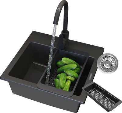 A black kitchen sink with a faucet running water into a colander filled with cucumbers. A sink strainer and a separate colander are also shown.