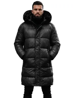 A man wearing a black puffer jacket.
