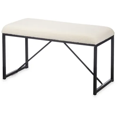 A white upholstered bench with a black metal frame, shown from a side-angle on a white background.
