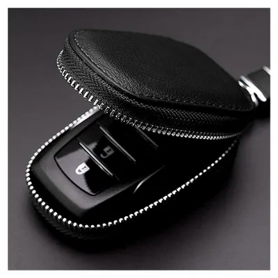 Produktbild von Autoschlüssel-Etui aus echtem Leder mit Signal-Schutz, universeller Schutz für Autoschlüssel mit Metall-Reißverschluss-Karabiner (Schwarz)