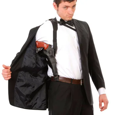 Erwachsener trägt schwarzes Schulterholster unter einem Sakko als Kostüm-Zubehör im Agenten-Look.